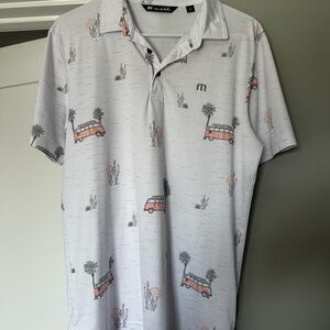 Travis Mathew White Short-Sleeve Polo with tropical desert Bus Print pattern
